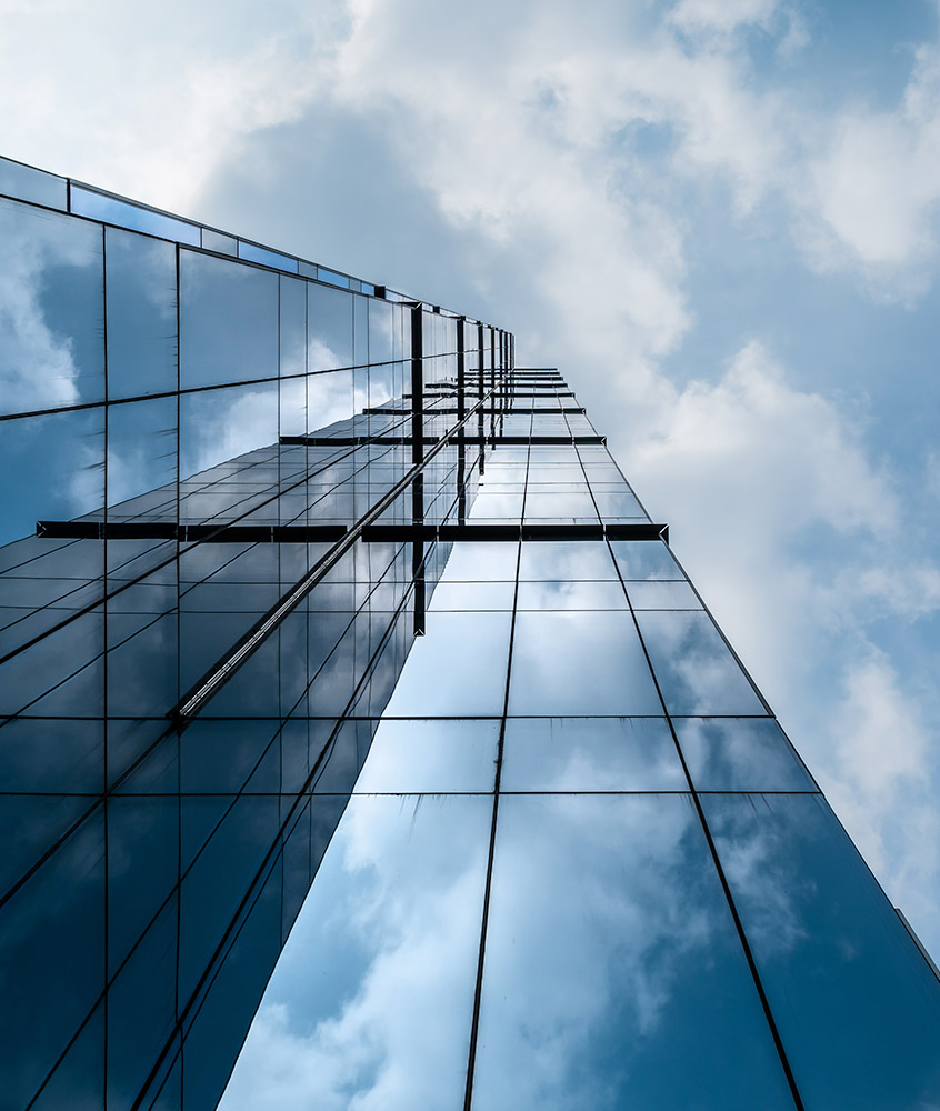 exterior, looking up at the top of a skyscraper at a sharp angle
